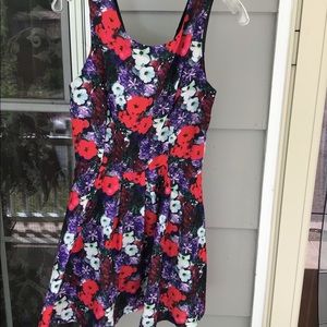 Ladies lined Dressy forever 21 size small flowered dress  low in back